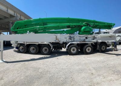 Finished paint job on a specialized work semi truck. Painted with a two tone white and green paint job to match a fleet.